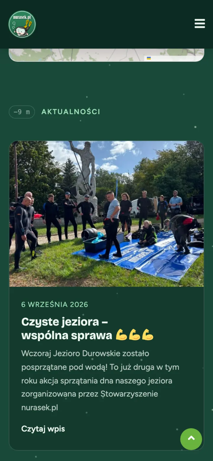 Karta aktualności na telefonie — relacja ze sprzątania jeziora